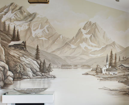 Wandbild in Umbra, Motiv: Berglandschaft Wasserfall und Bergsee, Steg, Ziegen, Gamsbock und Dorf mit Holzhütten und Kirche