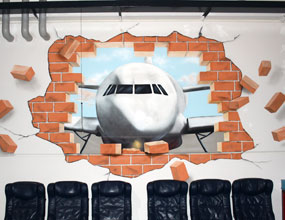 Wand-Durchbruch mit Flugzeug